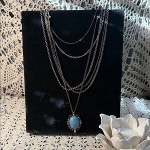 Layered Silver and gold tone necklace with Turquoise Pendant